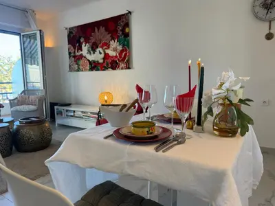 Coin salon dans l'établissement Superior Apartment on first floor with Sea View
