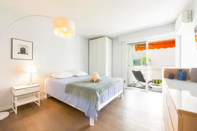 Un ou plusieurs lits dans un hébergement de l'établissement Moderne appartement 2 chambres1 salle de bain terrasse calmeaperçu mer