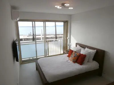 Un ou plusieurs lits dans un hébergement de l'établissement Iberia Beach Front Sea