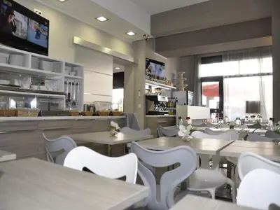 Restaurant ou autre lieu de restauration dans l'établissement Riviera Eden Palace