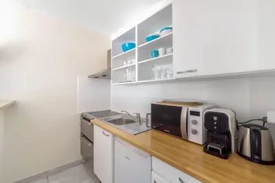 Cuisine ou kitchenette dans l'établissement Eden Azur - Résidence Hôtelière