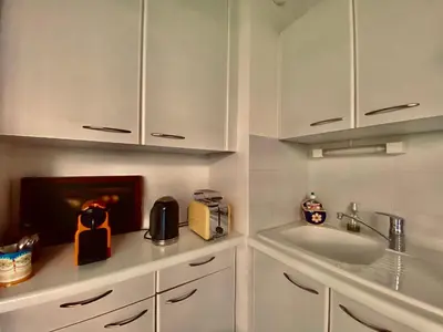 Cuisine ou kitchenette dans l'établissement Un Coin de Paradis