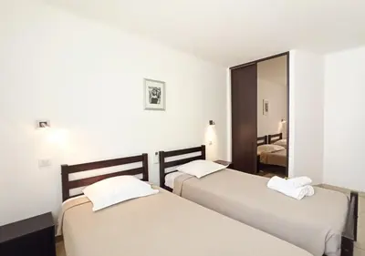 Un ou plusieurs lits dans un hébergement de l'établissement Viva Riviera 2 Bedrooms 2 Bathrooms Rue Florian