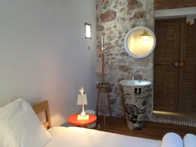 Un ou plusieurs lits dans un hébergement de l'établissement Hôtel de la Pinède