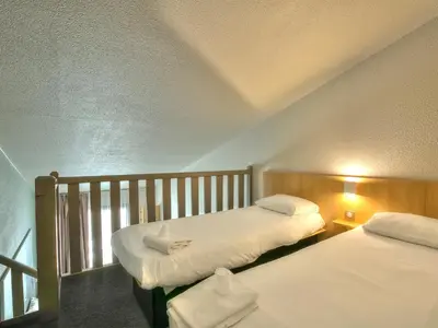 Un ou plusieurs lits dans un hébergement de l'établissement B&B HOTEL Villeneuve Loubet Village