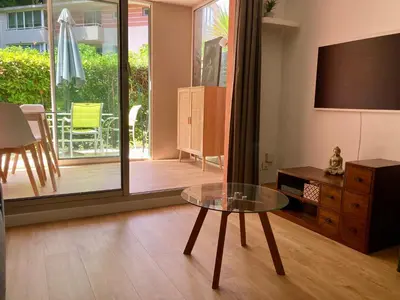 Télévision ou salle de divertissement dans l'établissement Zen Attitude Apartment