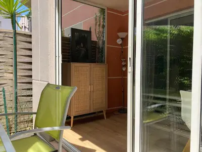 Télévision ou salle de divertissement dans l'établissement Zen Attitude Apartment