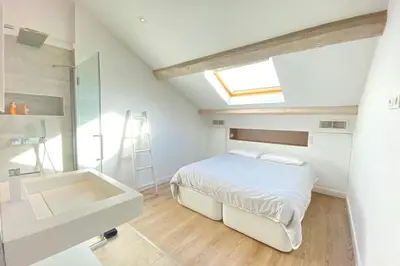 Un ou plusieurs lits dans un hébergement de l'établissement Modern & bright 4-room apartment in Cannes Banane