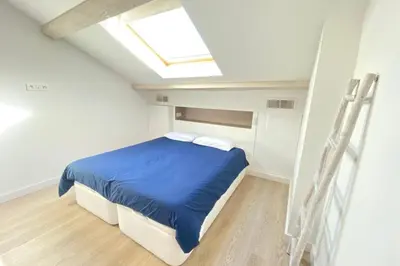 Un ou plusieurs lits dans un hébergement de l'établissement Modern & bright 4-room apartment in Cannes Banane