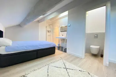 Un ou plusieurs lits dans un hébergement de l'établissement Modern & bright 4-room apartment in Cannes Banane
