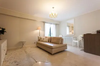 Coin salon dans l'établissement Carlton Riviera Apartment