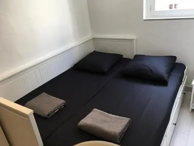 Un ou plusieurs lits dans un hébergement de l'établissement Studio Croisette Cannes