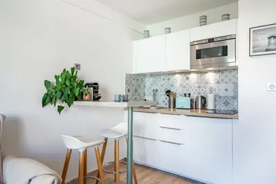 Cuisine ou kitchenette dans l'établissement STUDIO by the croisette