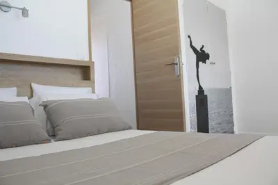 Un ou plusieurs lits dans un hébergement de l'établissement MOTEL ASCOT - Hotel & Appartements