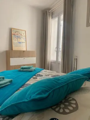 Un ou plusieurs lits dans un hébergement de l'établissement Appartement La Tourraque côté mer