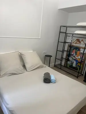 Un ou plusieurs lits dans un hébergement de l'établissement Touchlux apartments