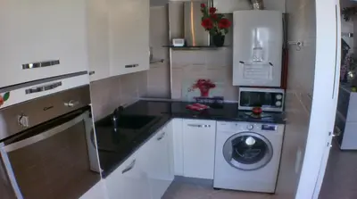 Cuisine ou kitchenette dans l'établissement Boite d'Amour