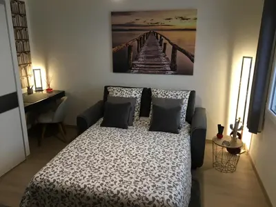 Un ou plusieurs lits dans un hébergement de l'établissement Lovely Studio Cannes