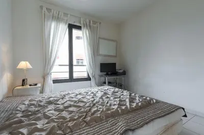 Un ou plusieurs lits dans un hébergement de l'établissement Appartement de charme à Cannes + terrasse