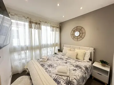 Un ou plusieurs lits dans un hébergement de l'établissement Cannes center perfect 3 bedroom