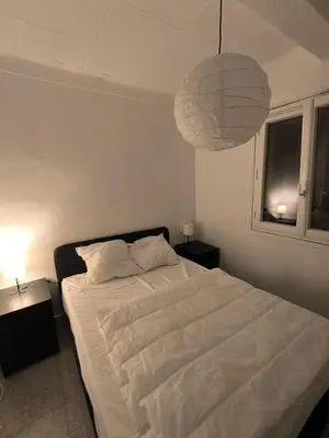 Un ou plusieurs lits dans un hébergement de l'établissement Villa Mané