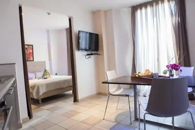 Un ou plusieurs lits dans un hébergement de l'établissement Hotel Villa d'Elsa