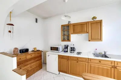 Cuisine ou kitchenette dans l'établissement Le Studio Provençal Welkeys