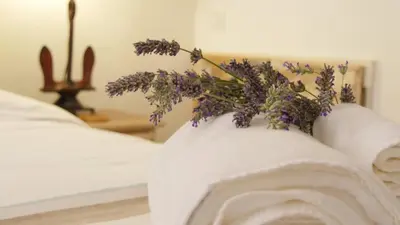 Un ou plusieurs lits dans un hébergement de l'établissement Maison De La Tour