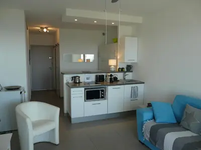 Cuisine ou kitchenette dans l'établissement Juan Plage