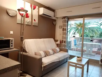 Coin salon dans l'établissement App T2 cozy Proche de la Mer