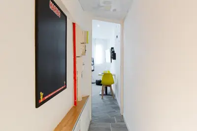 Télévision ou salle de divertissement dans l'établissement Atelier & Galerie