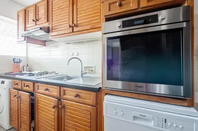 Cuisine ou kitchenette dans l'établissement Le Balcon sur la Baie - Welkeys