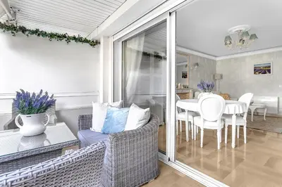 Coin salon dans l'établissement Appartement CANNES IMPERIAL Pointe Croisette