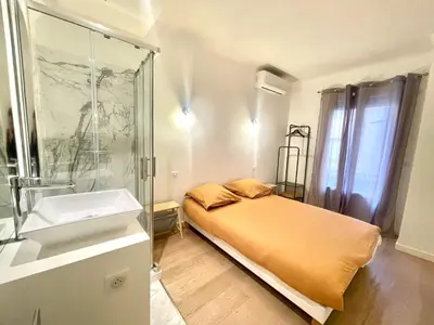 Un ou plusieurs lits dans un hébergement de l'établissement Pasteur by Welcome to Cannes