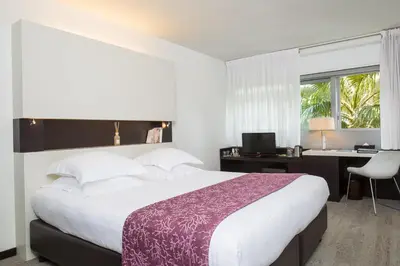Un ou plusieurs lits dans un hébergement de l'établissement Royal Antibes - Luxury Hotel, Résidence, Beach & Spa
