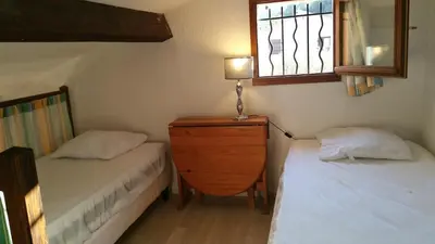 Un ou plusieurs lits dans un hébergement de l'établissement Résidence Cap Azur Maison N° 56