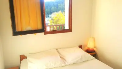 Un ou plusieurs lits dans un hébergement de l'établissement Résidence Cap Azur Appartement 108