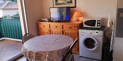 Cuisine ou kitchenette dans l'établissement Résidence Cap Azur Appartement 215