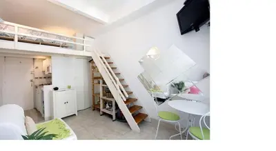 Un ou plusieurs lits dans un hébergement de l'établissement Studio- Antibes-Juan les Pins- Cote d'Azur