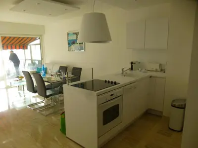 Cuisine ou kitchenette dans l'établissement Appartement Le Chantilly