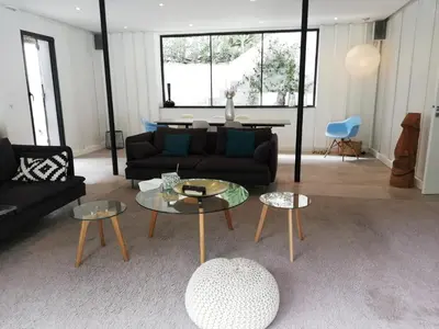 Coin salon dans l'établissement Villa Le Ruisseau