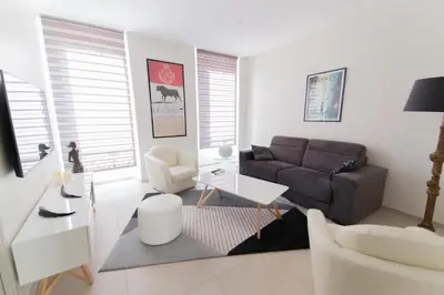 Coin salon dans l'établissement Alceste Apartment - Cannes Banane