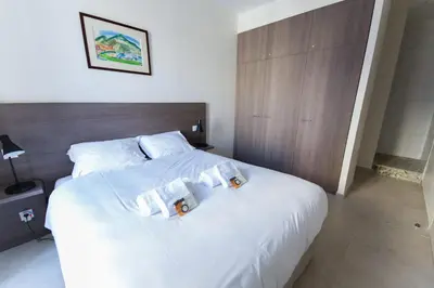 Un ou plusieurs lits dans un hébergement de l'établissement Alceste Apartment - Cannes Banane
