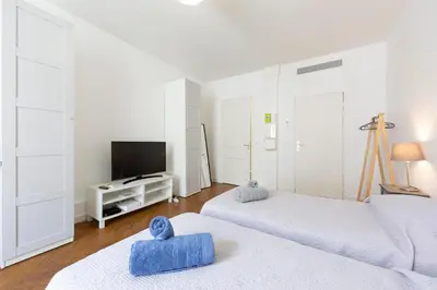 Un ou plusieurs lits dans un hébergement de l'établissement Cosy apartment 27 m2 in rue d'Antibes and Croisette
