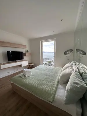 Un ou plusieurs lits dans un hébergement de l'établissement Croisette Palais Miramar - sea view