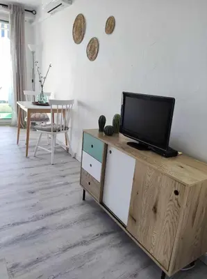 Télévision ou salle de divertissement dans l'établissement Studio 