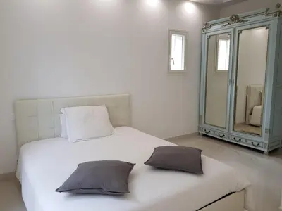 Un ou plusieurs lits dans un hébergement de l'établissement Magnifique Appartement Vue Mer