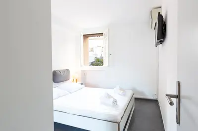 Un ou plusieurs lits dans un hébergement de l'établissement Chez Dominique - 1 chbre 2-4pers Centre Antibes Migrainier Ancien with AC