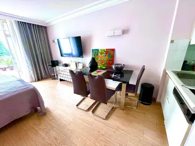 Télévision ou salle de divertissement dans l'établissement New - cosy & nice Apartment in Palais Miramar
