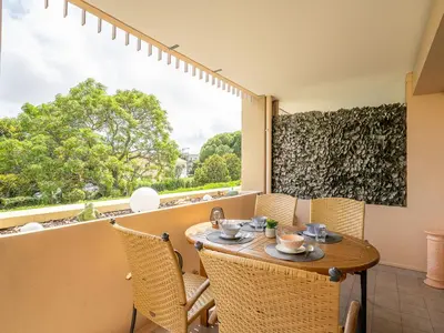 Coin salon dans l'établissement Apartment Le Mandarin by Interhome